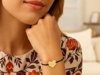 9 1/4 inch Black Cord Adjustable Bracelet with 14k yellow Gold Heart